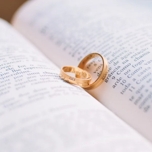 Weddign rings on a book